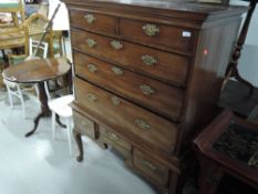 A Georgian mahogany chest on stand, upper section comprising two over three , with additional