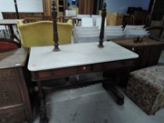 A Victorian mahogany wash stand having turned frame and marble top, with mirror posts, width approx.