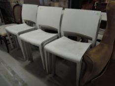 Twelve white moulded plastic patio chairs, need a good clean but look sound enough, similar to lot