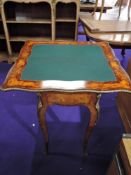 An early 20th Century continental style inlaid fold over card table, with ormolu effect detailing,