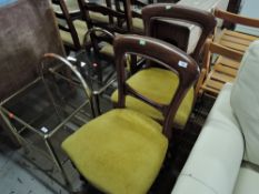 A pair of Victorian mahogany balloon back dining chairs