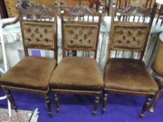 Three button back upholstered dining chairs