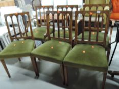 A set of six (four plus two) reproduction Regency dining chairs having upholstered seats