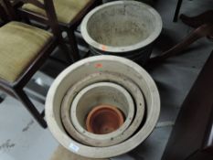 A selection of large modern garden planters