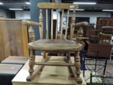 An traditional stripped child's rocking chair