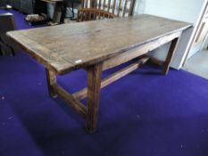 A rustic stained kitchen table, of primitive design, approx. 210 x 77cm