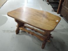 A solid oak table in a rustic design standing approx 50cm