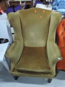 A mahogany frame wing back armchair, good heavy frame of nice quality