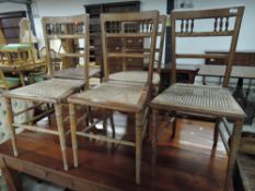 A selection of five Victorian cane seated bedroom chairs, all similar designs , with bobbin backs