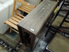 A traditional mahogany sutherland style gateleg dining table