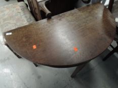 A 19th Century mahogany 'D' half moon table