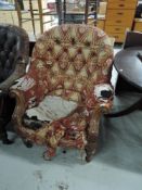 A 19th Century button back easy chair having oak frame, good solid frame for upholstery project