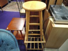 A modern pine stool and a wicker occasional table