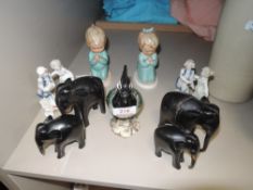 A selection of figures and figurines including Geobel Bless Us All and Beswick Lapwing