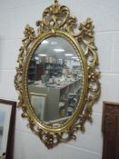A modern Chippendale styled mirror