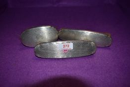 Three vintage HM silver backed brushes having engine turned decoration