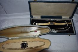Two simulated pearl necklaces in original cases and three lady's wrist watches including Sekonda and