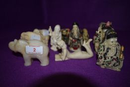 A selection of cast and carved Chinese and similar oriental figures including Elephant, Nude lady