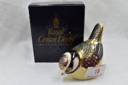 A Royal Crown Derby Blue Tit paperweight, boxed with gold stopper