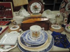 A selection of ceramics and curios including white glaze tea cup and saucer sets