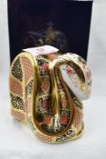 A Royal Crown Derby Snake paperweight, boxed with gold stopper