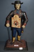 A reproduction German or Dutch figural clock of a Watch Seller AF