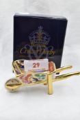 A Royal Crown Derby Wheelbarrow, with box