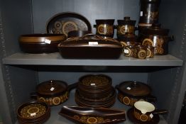 A large selection of dinner and table wares by Denby in the Arabesque design