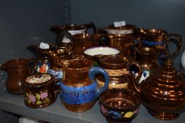 A selection of lustre ware ceramics including teapot and creamers