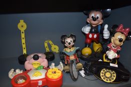 A selection of Mickey and Minnie mouse collectables by Walt Diney including Super Fone