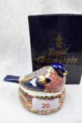 A Royal Crown Derby Bullfinch nesting paperweight, boxed with gold stopper