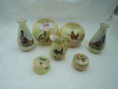 A selection of Royal Worcester hand decorated trinkets including mirrored pheasant vase