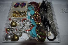 A selection of costume jewellery necklaces and earrings including a pair of Trifari clip back (AF)