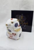 A Royal Crown Derby Collectors Guild Harvest Mouse paperweight, boxed with gold stopper
