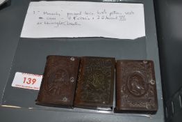 A selection of pressed horn Vesta cases with royal imagery