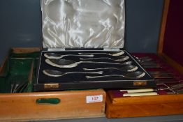 A selection of boxed cutlery and flatwares including bone handled and similar loose