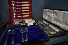 A cased set of fish knives and forks similar cased set of fish servers and a part set of