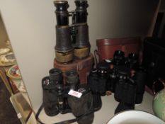 A selection of binoculars including Miranda 16x50 Tasco 7x50 and Omega 30x50 all having cases