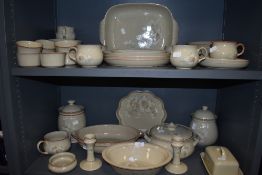 A large selection of dinner and table wares by Denby in the Day Break design