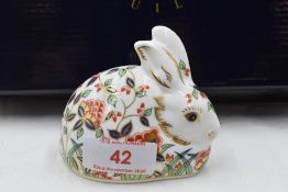 A Royal Crown Derby Collectors Guild Meadow Rabbit paperweight, boxed with gold stopper