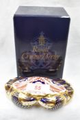 A Royal Crown Derby Crab paperweight, boxed with gold stopper