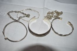 Six white metal bracelets and bangles, all stamped 925 and of various designs