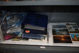 A selection of collectable postcards and similar ephemera