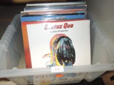 A selection of rock interest vinyl records including Beatles and Def Leopard