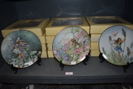 Two sets of boxed ceramic display plates by Villeroy and Boch designed by Cicely Mary Barker