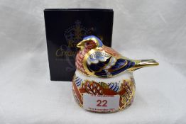 A Royal Crown Derby Chaffinch nesting paperweight, boxed with gold stopper