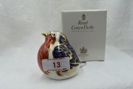 A Royal Crown Derby Robin paperweight, boxed with gold stopper