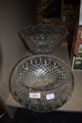 Two large leaded crystal glass bowls one having foot to base