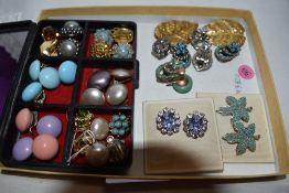 A small selection of vintage clip and stud fashion earrings including vintage styles in an