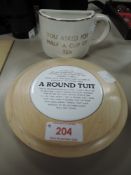 Two novelty items, one being a half cup 'you asked for half a cup of tea' and the other 'A Round